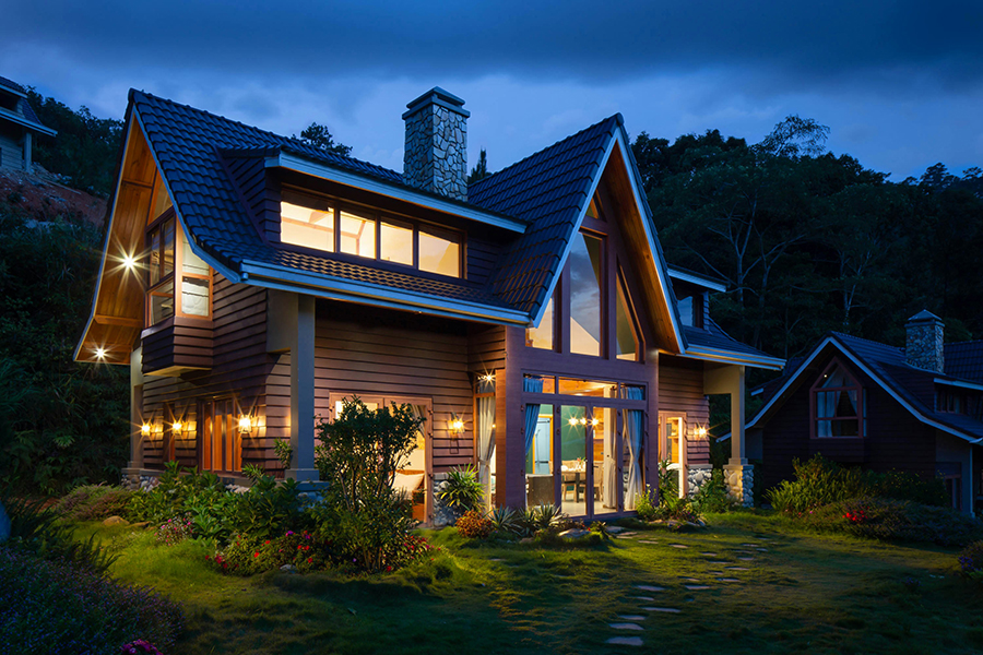 House surrounded by trees in Marquette, MI, representing rural Upper Peninsula real estate