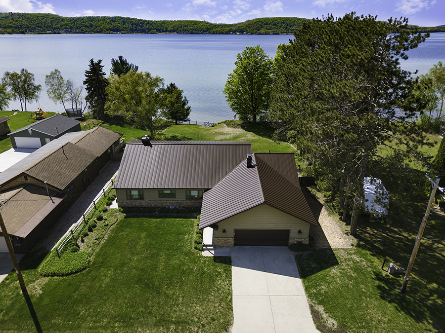 Front view of a spacious Lake Superior waterfront home for sale in Munising, Michigan